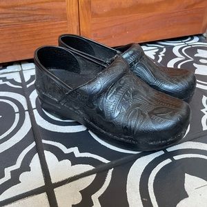 Dansko tooled leather clogs